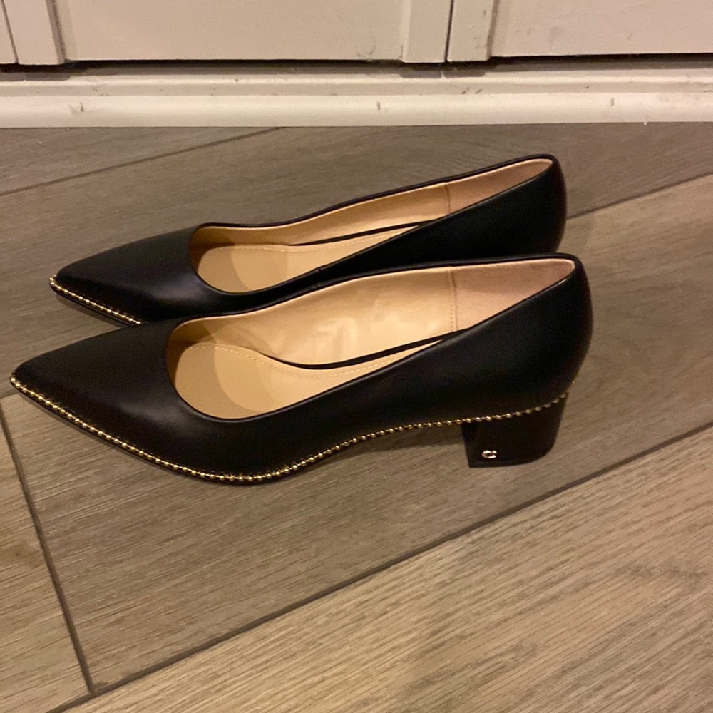 Brand new without box.  Love these shoes but they just don’t fit!